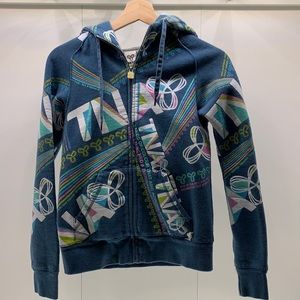 Cozy multicoloured TNA zip-up hoodie!